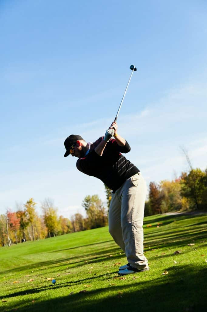 Man playing golf